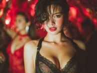 Woman in lace bra with red lipstick, possibly related to KL escort services in Kuala Lumpur.