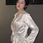 Woman in a white satin dress