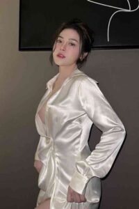 Woman in a white satin dress