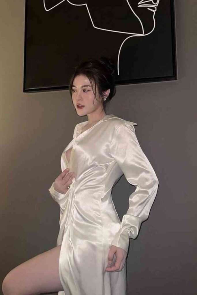 Young woman in a satin dress, Tina, Kuala Lumpur escort, B2B massage