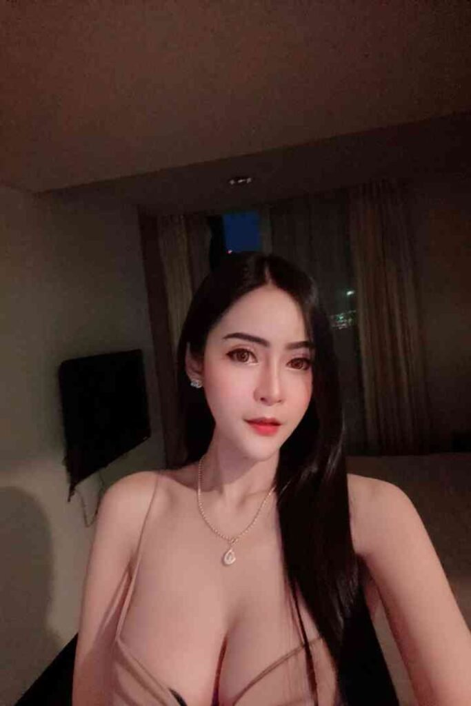 Hana Thailand escort with long dark hair and a necklace
