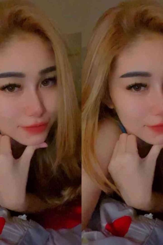 Pika Local Malay Escort posing with long blonde hair, red lipstick, and red heart