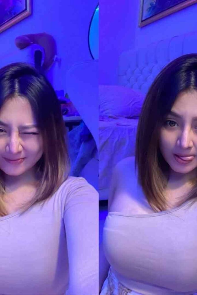Tasya, a 165cm C-cup beauty, winks and sticks out her tongue in a playful selfie.